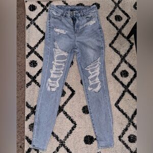 American Eagle Outfitters Light Blue Distressed Skinny Jeans